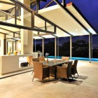 Outdoor Dining Of Captivating Outdoor Dining Space Design Of Areopagus Residence With Dark Brown Chairs Made From Rattan And Glass Panel Surface Of Dining Table Dream Homes Stunning Hill House Design With Sophisticated Lighting In Costa Rica