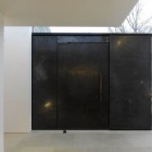 Black Door Get Casual Black Door Design To Get Balance Design In The White Room Interior And Matched With Semi Outdoor Design Dream Homes Beautiful Grey Paint Colors For Your Perfect Contemporary Homes