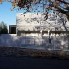 White Themed Exterior Charming White Themed Luff Residence Exterior Shady Greenery White Painted Wood Fence Colorful Window Artistic Pillars On Porch Architecture Astonishing Contemporary Concrete Home With Minimalist Interior Features