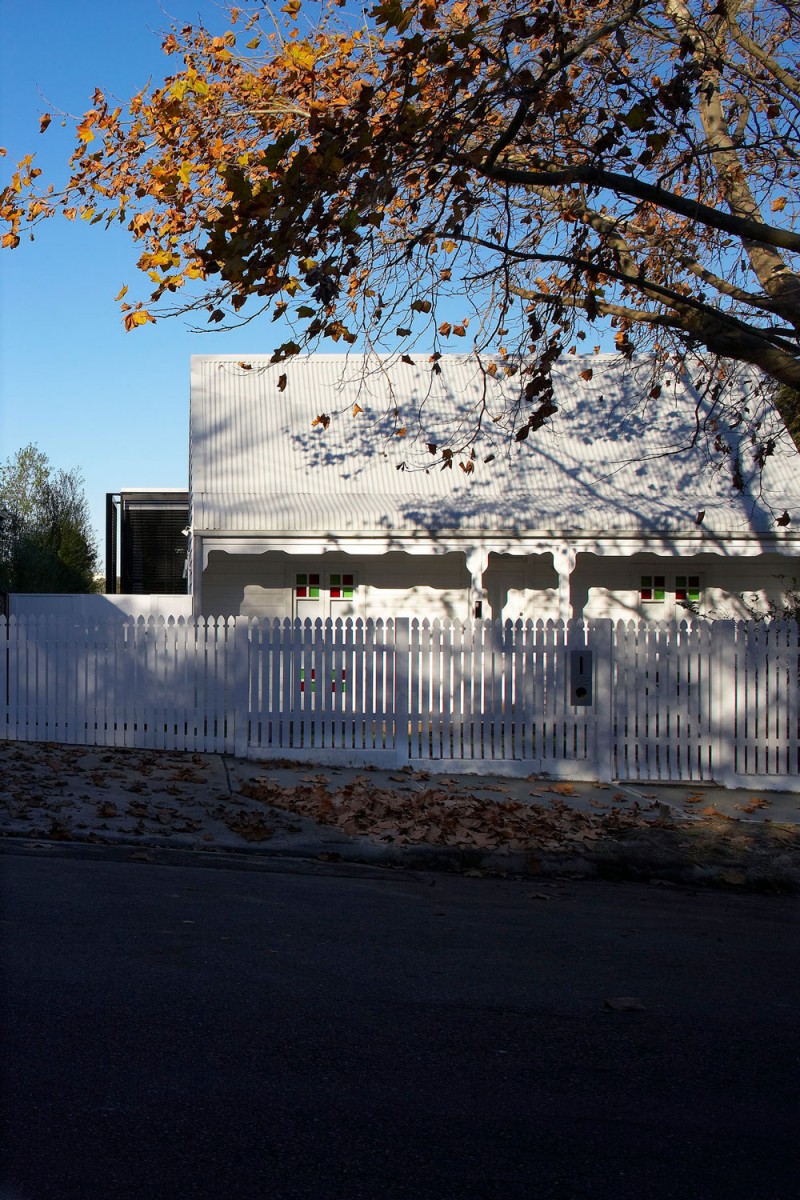 White Themed Exterior Charming White Themed Luff Residence Exterior Shady Greenery White Painted Wood Fence Colorful Window Artistic Pillars On Porch Architecture Astonishing Contemporary Concrete Home With Minimalist Interior Features