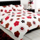White Red Patterned Chic White Red Brown Blossom Patterned Duvet Set On Black Wooden Bed Installed On White Wooden Striped Floor With Black Nightstand Bedroom Cool And Lovely Bedroom Designs With Creative Duvet Covers