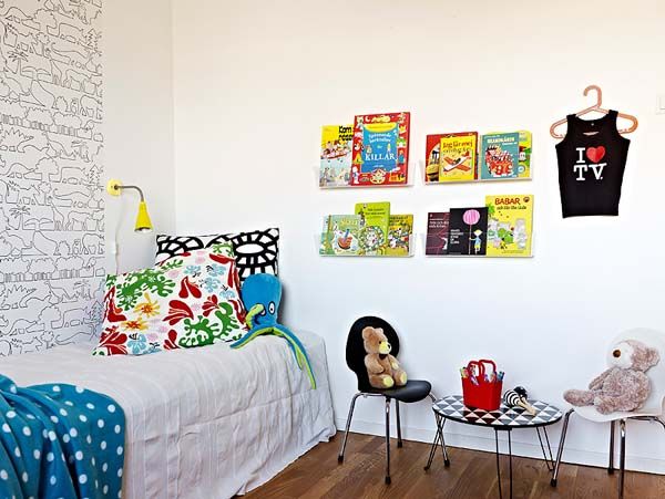 White Red Pillow Chic White Red Green Patterned Pillow On White Bed With Yellow Curved Wall Lamp In Kids Bedroom Using Contemporary Semi Open House Dream Homes Casual Contemporary Home With Stunning Colorful Interior Designs