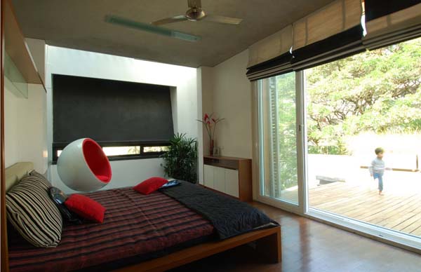 Bedroom With Pillow Comfy Bedroom With Black White Pillow And Red Cushions In Stacked House And Sliding Glass Door Showing Outside View Dream Homes  Contemporary Beach Front Home With Stunning Stacked Architecture