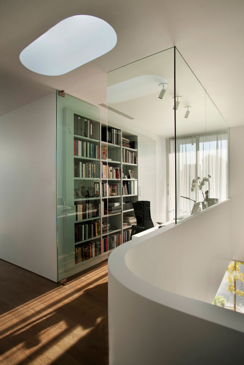 Home Office The Contemporary Home Office Space Inside The Modern Family Residence With White Bookshelves And Black Chair Near White Desk Dream Homes  Duplex Contemporary Concrete Home With Outdoor Green Gardens For Family