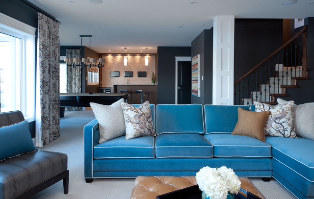 Living Room Sectional Contemporary Living Room With Blue Sectional Sofa And Multi Color Pillows Also Tufted Coffee Table And Gray Chair Furniture Beautiful Blue Sectional Sofas To Making A Cozy And Comfortable Interiors