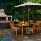 Patio Ideas Fireplace Contemporary Patio Ideas With Outdoor Fireplace Designs Beside Dining Table Feat Fruits Under The Umbrella Decoration Decoration Classic Outdoor Fireplace Designs For Impressive Exterior Decoration