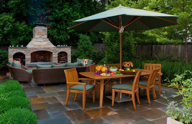 Patio Ideas Fireplace Contemporary Patio Ideas With Outdoor Fireplace Designs Beside Dining Table Feat Fruits Under The Umbrella Decoration Decoration  Classic Outdoor Fireplace Designs For Impressive Exterior Decoration