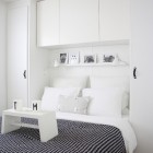 Storage Ideas Bedrooms Contemporary Storage Ideas For Small Bedrooms White Wall Shelf Polka Dot Bed Cover Cute Ornaments Bright White Pillows Bedroom 16 Smart Storage Ideas For Small Bedrooms Applications