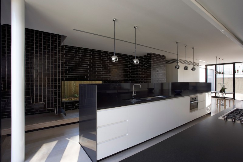 Ball Pendant Black Cool Ball Pendant Lights Above Black And White Kitchen Corner Flashy Black Brick Wall Metallic Staircase In Modern Luff Residence Architecture Astonishing Contemporary Concrete Home With Minimalist Interior Features