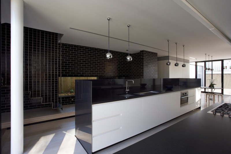 Ball Pendant Black Cool Ball Pendant Lights Above Black And White Kitchen Corner Flashy Black Brick Wall Metallic Staircase In Modern Luff Residence Architecture  Astonishing Contemporary Concrete Home With Minimalist Interior Features