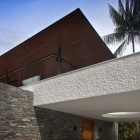 Textured Exterior Of Cool Textured Exterior Wall Part Of Water Cooled House Mixed With Stone Cladded Wall Dominating The House Exterior Decoration Elegant And Beautiful Home Design Presented By The Water-Cooled House