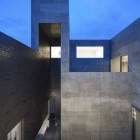 Two Floor Silence Cool Two Floor House Of Silence Building Idea Covered By Stone Veneer Seen By Evening Illuminated By Ground Lamps Dream Homes Sophisticated Modern Japanese Home With Concrete Construction Of Shiga Prefecture