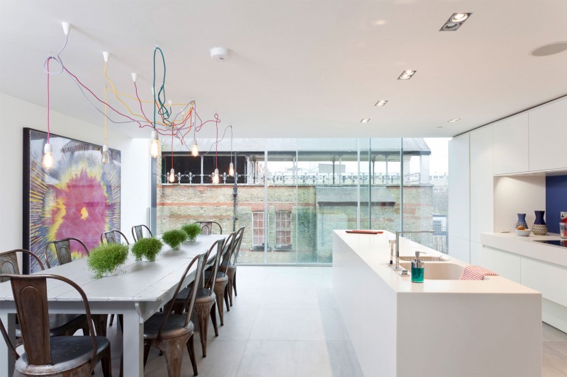 White Interior The Cool White Interior Design Of The Water Tower Residence Dining Room Idea Involved Gray Dining Table Completed Centerpiece Dream Homes  An Old Water Tower Converted Into A Luminous Modern Home With Sliding Glass Walls