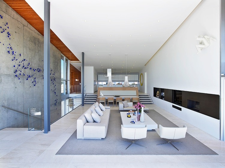 Family Room White Cozy Family Room Design With White Sofa And White Coffee Table On Grey Carpet At Long Island Beach House Dream Homes Elegant Contemporary Beach House With Stylish Interior Decorations