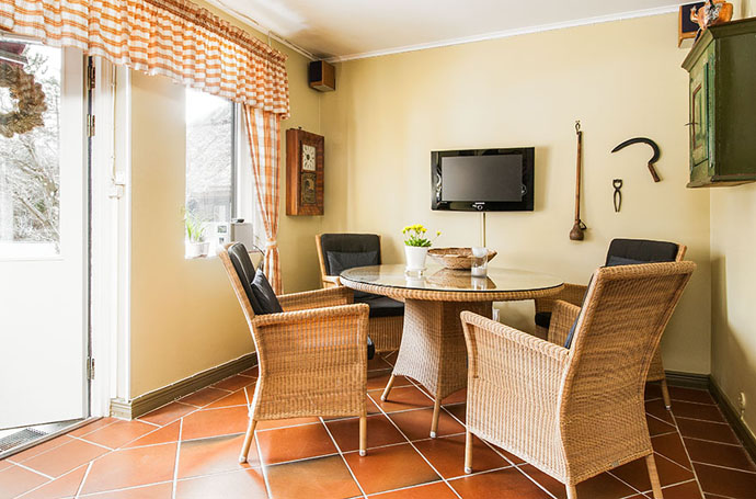House Formal Integrating Cozy House Formal Dining Room Integrating Round Glass Table With Wicker Chairs Set For Four With Black Cushion Dream Homes Wonderful Modern Home With Verdant Garden Decorations