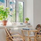 Decoration At Window Creative Decoration At Swedish Apartment Window Seat Area Applied Rattan Chairs And Coffee Table Designs Apartments Stylish Swedish Interior Style Apartment With Wooden Furniture Accents