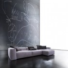 Wall Design Sofas Creative Wall Design Facing Italian Sofas Feat Black Pillows And Glossy Floor Make Nice The Interior Design Decoration Trendy Italian Sofas For Chic Living Room Furniture And Ornaments