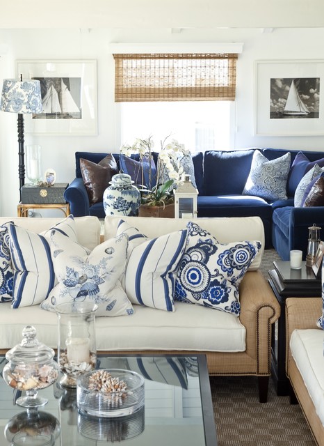 Blue Sofas Facing Cute Blue Sofas With Pillows Facing Glass The Table Feat Ashtray And Porcelains In Transparent Pattern Furniture Cool Blue Sofas Generate Breezy Impression In Your Living Room