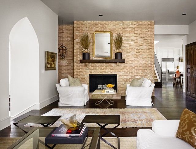 Livign Room Ni Dudley Living Room With Ottoman In Black Color Beside The Fireplace Mantels Facing The White Sofas Decoration  Sophisticated Fireplace Mantel Decoration For Cozy Home Interiors