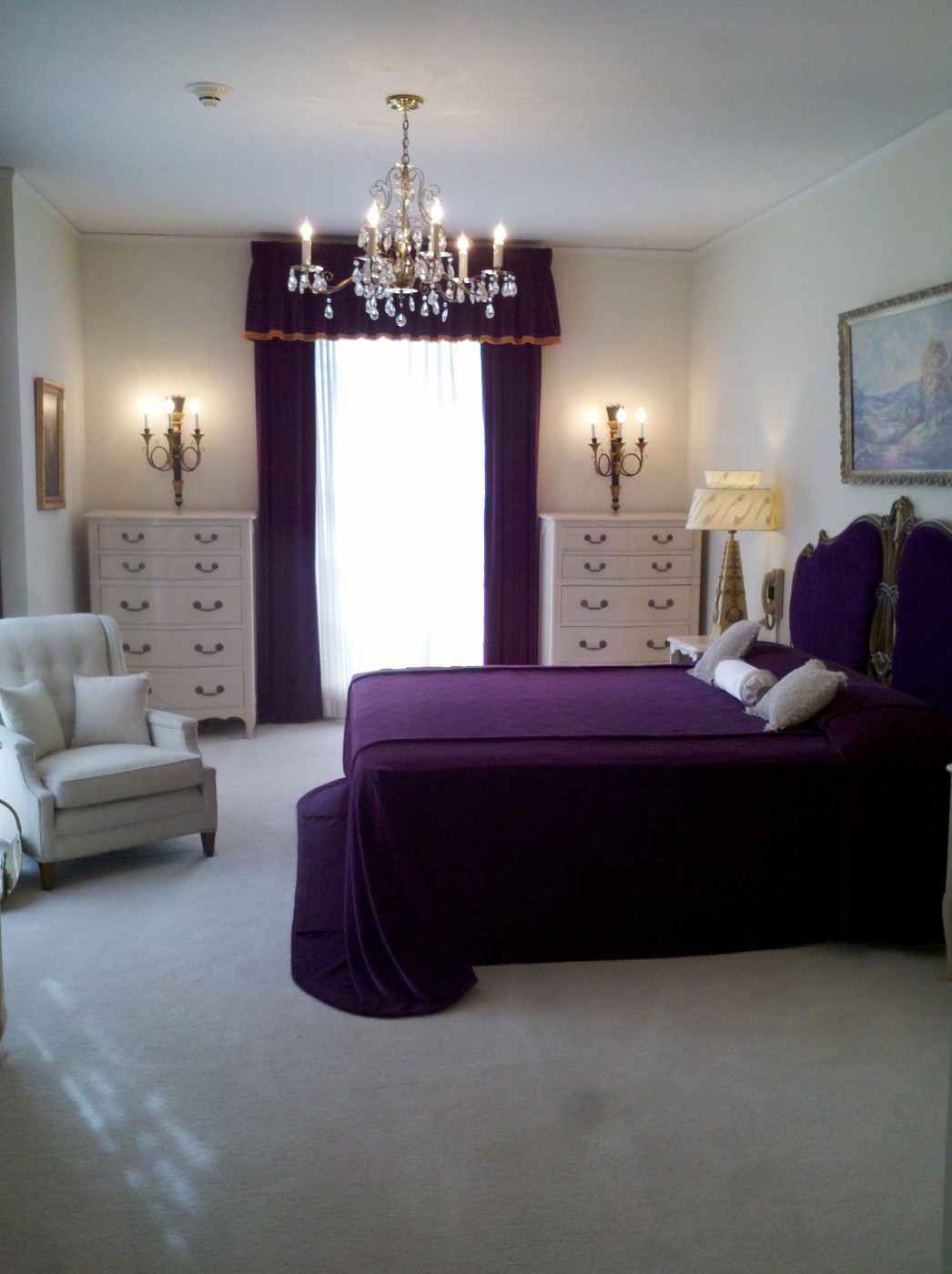 Purple Bedroom Dark Easy Purple Bedroom With Crisp Dark Purple Bed And Cozy Purple Headboard Under Turquoise Crystal Chandelier Plus Cute White Simple Single Sofa And Lovely White Drawer Palette Bedroom 26 Bewitching Purple Bedroom Design For Comfort Decoration Ideas