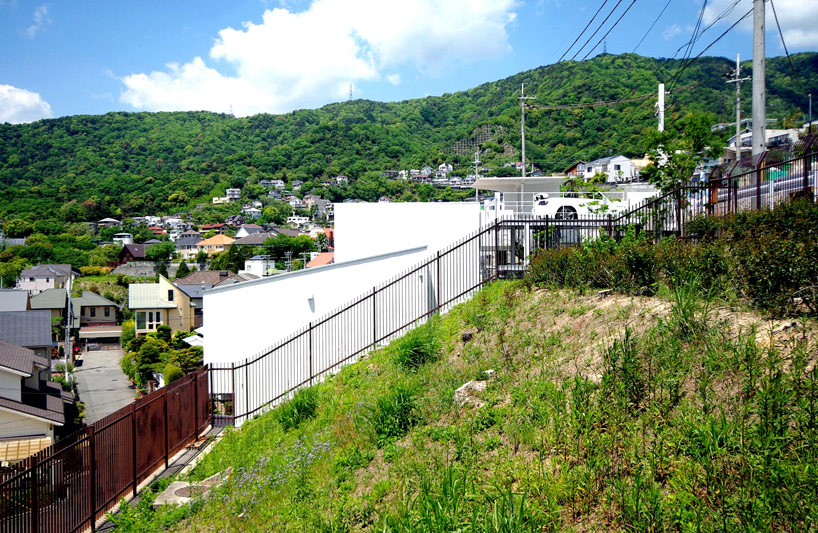 Kenji Yanagawa House Eclectic Kenji Yanagawa Case Study House Exterior With Peaceful Mountainous View Elegant Wood Fence Natural Ornamental Plants Dream Homes  Stunning Contemporary Hillside Home With Open Garage Concepts