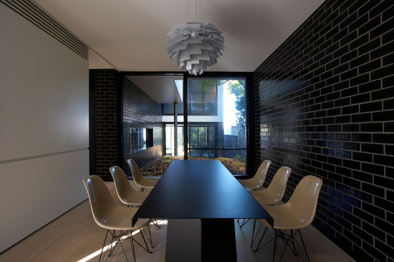 Luff Residence Dark Eclectic Luff Residence Interior With Dark Dining Table Floral Shaped Pendant Light White Acrylic Chairs Wood Floor Architecture  Astonishing Contemporary Concrete Home With Minimalist Interior Features