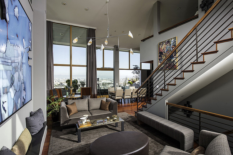 House San Fredman Elegant House San Francisco Susan Fredman Design Group Double Height Living Room With Blue Wall Art Interior Design Modern Mountain Home With Concrete Exterior And Interior Structure