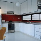 Kitchen With Interior Elegant Kitchen With Modern White Interior Design And Red Backsplash Of The Casa Dorrego In Argentina Dream Homes Bright And White Exterior Color Schemes For Your Modern House