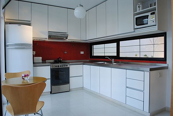 Kitchen With Interior Elegant Kitchen With Modern White Interior Design And Red Backsplash Of The Casa Dorrego In Argentina Dream Homes Bright And White Exterior Color Schemes For Your Modern House