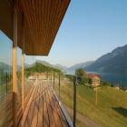 Balcony Design Am Enchanting Balcony Design Of Wohnhaus Am Walensee Residence With Soft Brown Wooden Floor And Transparent Handrail Made From Glass Material Architecture Beautiful Rectangular Lake Home With Wood And Concrete Elements