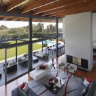 Living Room Dark Enchanting Living Room Design With Dark Grey Colored Sofa And Soft Grey Colored Rug Carpet On The Floor Dream Homes Gorgeous Contemporary Home With Rectangular Structure And Large Glass Walls