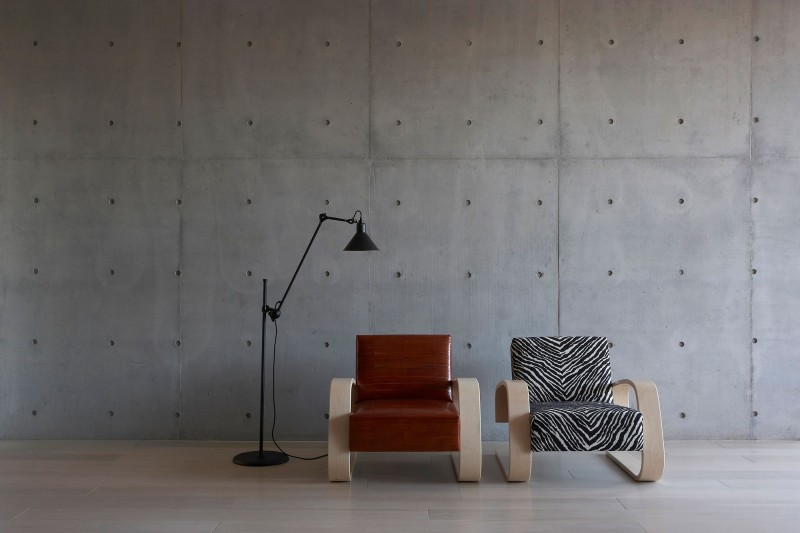 Luff Residence Compact Excellent Luff Residence Interior With Compact Leather Armchairs Modern Sectional Dark Metallic Floor Lamp Tough Concrete Wall Architecture Astonishing Contemporary Concrete Home With Minimalist Interior Features