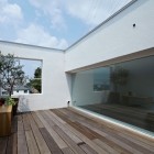 White Interior Hiyoshi Excellent White Interior Design In Hiyoshi Residence Beautified With Wooden Striped Floor And Decorative Tree Outside The House Architecture Beautiful Minimalist Home Decorating In Small Living Spaces