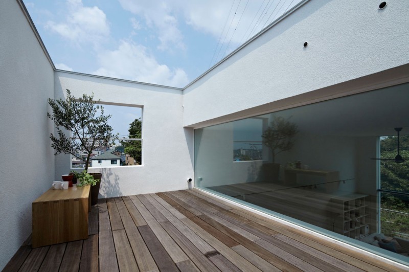 White Interior Hiyoshi Excellent White Interior Design In Hiyoshi Residence Beautified With Wooden Striped Floor And Decorative Tree Outside The House Architecture Beautiful Minimalist Home Decorating In Small Living Spaces