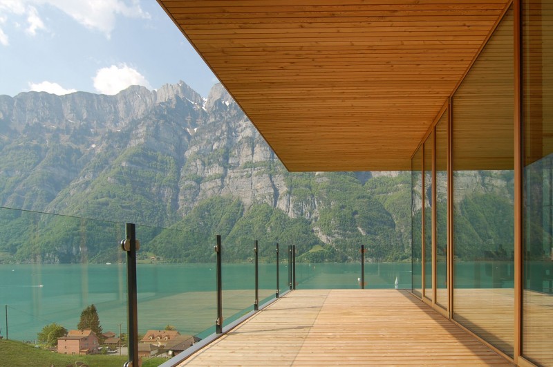 Balcony Design Am Exciting Balcony Design Of Wohnhaus Am Walensee Residence With Transparent Glass Handrail And Beautiful View Of Big Blue Lake Architecture Beautiful Rectangular Lake Home With Wood And Concrete Elements