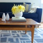 Details Of Table Exciting Details Of Wooden Coffee Table At Mid Century Living Room With Blue Sectional Sofa And Striped Pillow Furniture Beautiful Blue Sectional Sofas To Making A Cozy And Comfortable Interiors