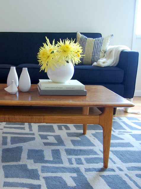 Details Of Table Exciting Details Of Wooden Coffee Table At Mid Century Living Room With Blue Sectional Sofa And Striped Pillow Furniture Beautiful Blue Sectional Sofas To Making A Cozy And Comfortable Interiors