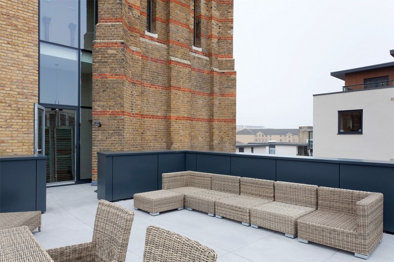 Rattan L Installed Fabulous Rattan L Shaped Sofa Installed On Terrace Outside The Water Tower Residence With Rattan Dining Table And Chairs Dream Homes  An Old Water Tower Converted Into A Luminous Modern Home With Sliding Glass Walls