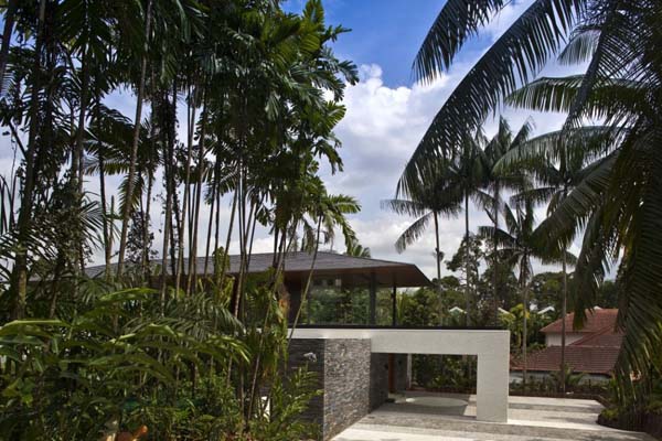 Water Cooled View Fabulous Water Cooled House Facade View Displaying Lush Vegetation And Concrete Stone Fence Surrounding The House Decoration Elegant And Beautiful Home Design Presented By The Water-Cooled House