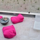 Pink Outdoor At Fancy Pink Outdoor Bean Bags At Long Island Beach House Patio With Modern Lounger And Fire Pit Dream Homes Elegant Contemporary Beach House With Stylish Interior Decorations