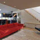 Contemporary Living Completed Fantastic Contemporary Living Room Layout Completed Staircase Beside Red Sofa And Black Tufted Lounge And Carpet Decoration 20 Vibrant And Bright Red Sofas For Chic Living Room With Personality
