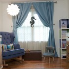 Undersea Nursery Interior Fantastic Undersea Nursery Room Design Interior With Wooden Crib And Grey Rocking Chair Furniture Used White Chandelier Lighting Kids Room Colorful Baby Room With Essential Furniture And Decorations