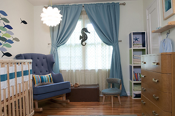 Undersea Nursery Interior Fantastic Undersea Nursery Room Design Interior With Wooden Crib And Grey Rocking Chair Furniture Used White Chandelier Lighting Kids Room  Colorful Baby Room With Essential Furniture And Decorations