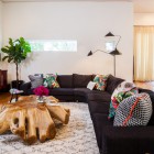 Living Room Sofas Fascinating Living Room With Black Sofas Feat Nice Pillows Facing Wooden Table And Fur Rug Design Decoration Dramatic Yet Elegant Bold Black Sofas For Exquisite Interior Decorations