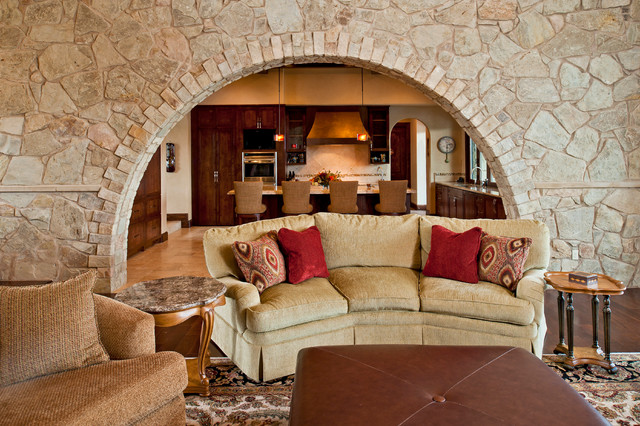 Mediterranian Family With Fascinating Mediterranean Family Room Design With Bright Yellow Colored Small Sofa Several Pillows And Bright Stone Curvy Wall Decoration  Lovely And Small Sofa Furniture Examples For Your Inspiration