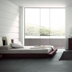 Open Bedroom With Fascinating Open Bedroom Which Furnished With Maroon Vanity Dresser And Maroon Bed With White Bedding On Black Floor Tiles Bedroom 15 Neutral Modern Bedroom Decoration In Stylish Interior Designs