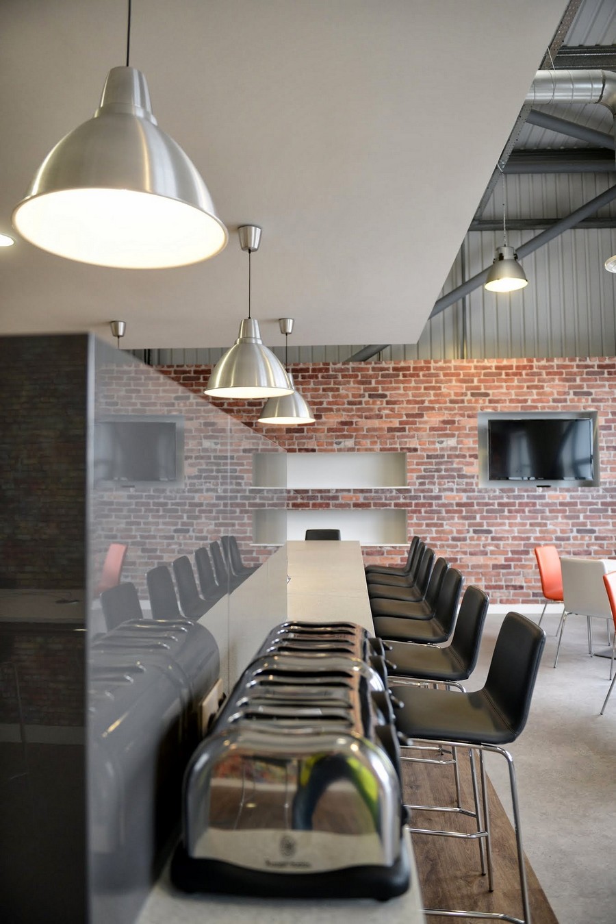 Room Space Nsg Fascinating Room Space Design Of NSG Modern Offices With Several Black Colored Stools Which Has Silver Stainless Feet Architecture Elegant And Modern Dining Room Sets With Wonderful Brick Walls