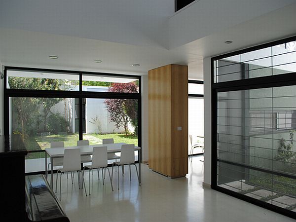 White Dining Design Fascinating White Dining Area Interior Design With Minimalist Dining Chair Design Of Casa Dorrego In Argentina Dream Homes  Bright And White Exterior Color Schemes For Your Modern House