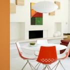 Red Chair The Fashionable Red Chair Design In The Modern White Interior Design Of Abraham Residence Completed With Colorful Wall Painting Dream Homes Simple Contemporary Home With Rectangular Swimming Pool And White Color Dominates