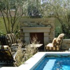 Swimming Pool Water Fresh Swimming Pool With Blue Water Feat Outdoor Fireplace Designs That Planters Accompany The Area Decoration Classic Outdoor Fireplace Designs For Impressive Exterior Decoration